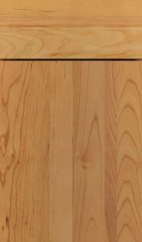 Della Cherry slab cabinet door in Natural