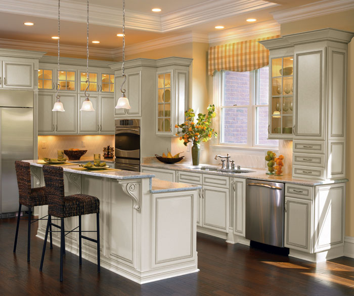 Off white cabinets with glaze by Decora Cabinetry