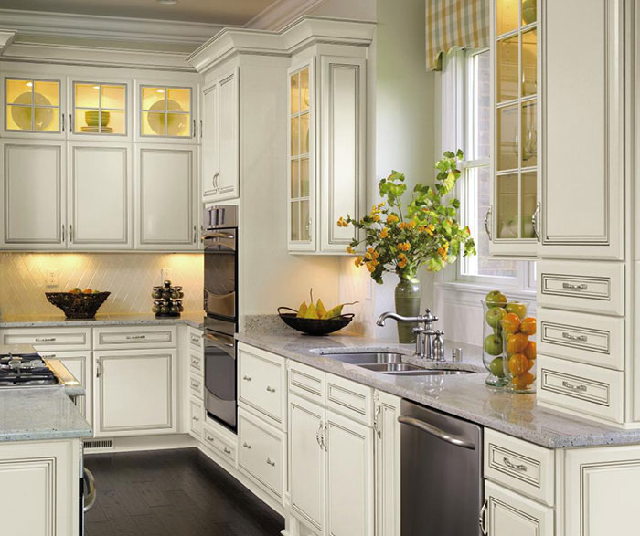 Off white cabinets with glaze by Decora Cabinetry
