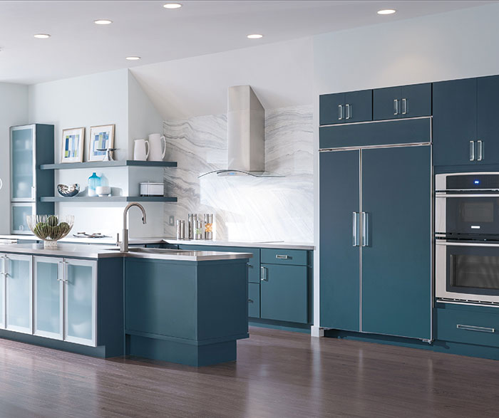 Blue painted kitchen cabinets by Decora Cabinetry