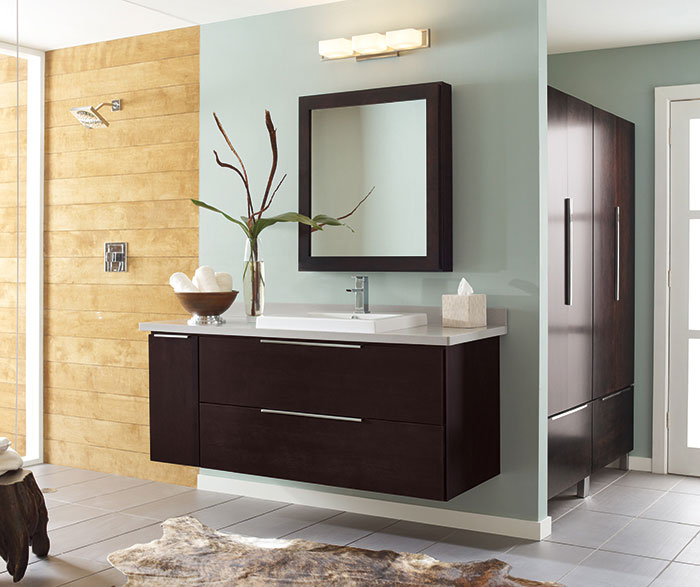 Wall-mounted bathroom vanity in dark Cherry by Decora Cabinetry