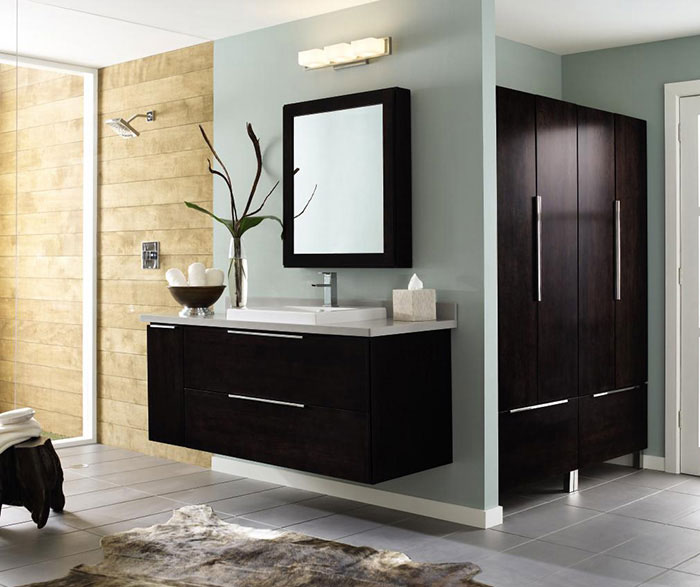 Wall-mounted bathroom vanity in dark Cherry by Decora Cabinetry