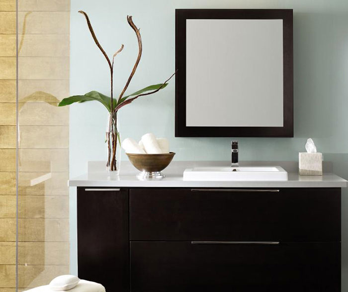 Wall-mounted bathroom vanity in dark Cherry by Decora Cabinetry