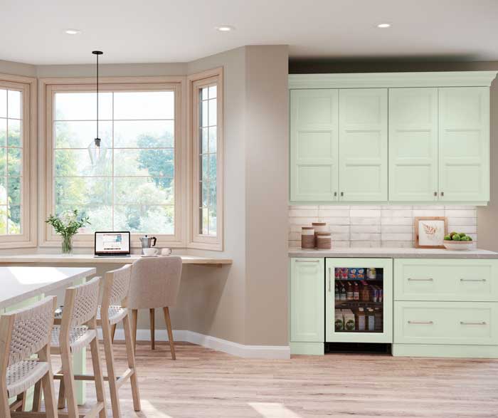 Fleeting Green Kitchen Cabinets and Matching Island