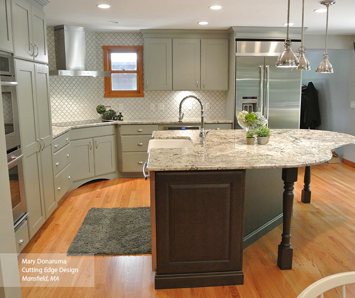 Open kitchen design with painted Maple Artisan cabinets and dark Cherry Maxwell cabinets