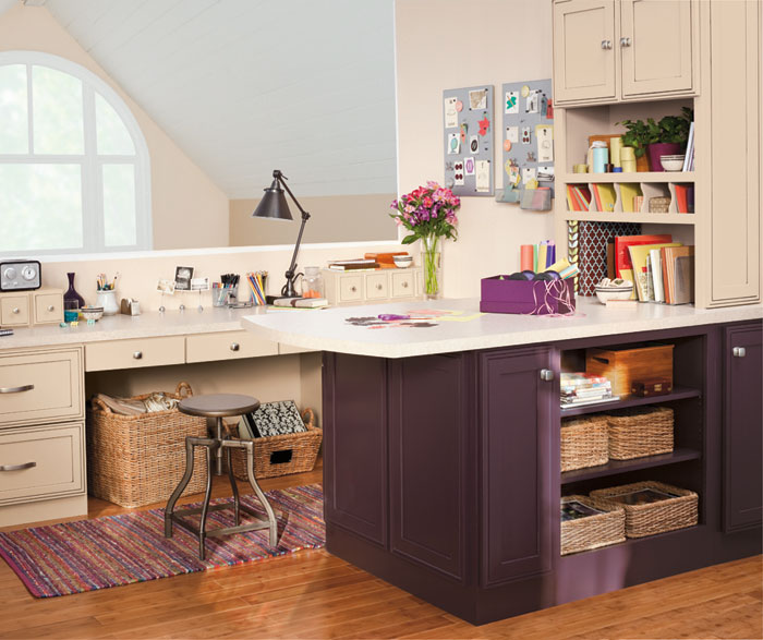 Home office with purple cabinets by Decora Cabinetry