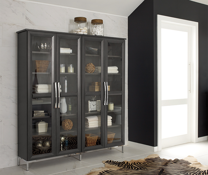 Bathroom storage cabinet with glass doors by Decora Cabinetry