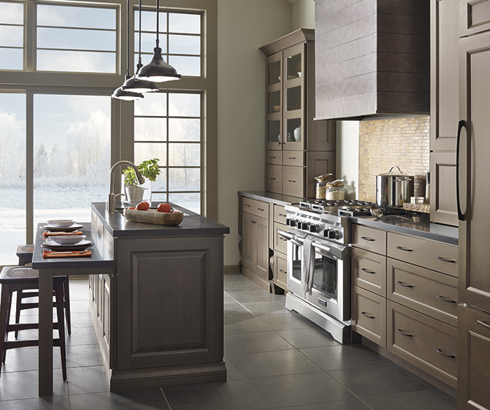 Gray kitchen cabinets with island by Decora Cabinetry